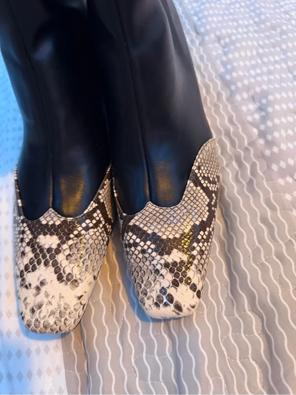 Black Knee-High Boots with Snake-Print Toe